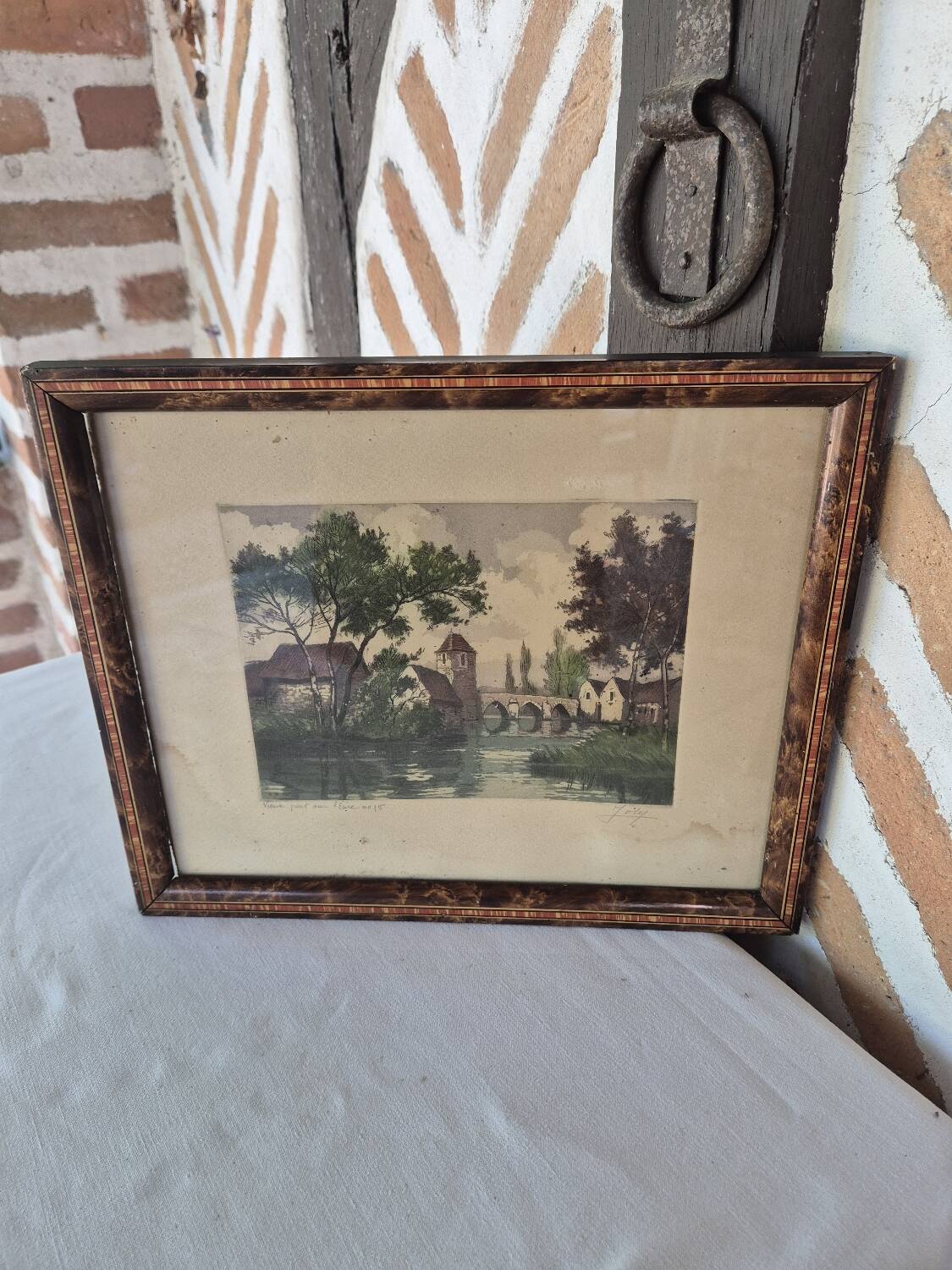 Antique painting of an old bridge over the Eure