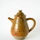 Glazed stoneware coffee service consisting of a coffee pot and 5 cups.