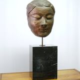 Buddha head sculpture, marble base