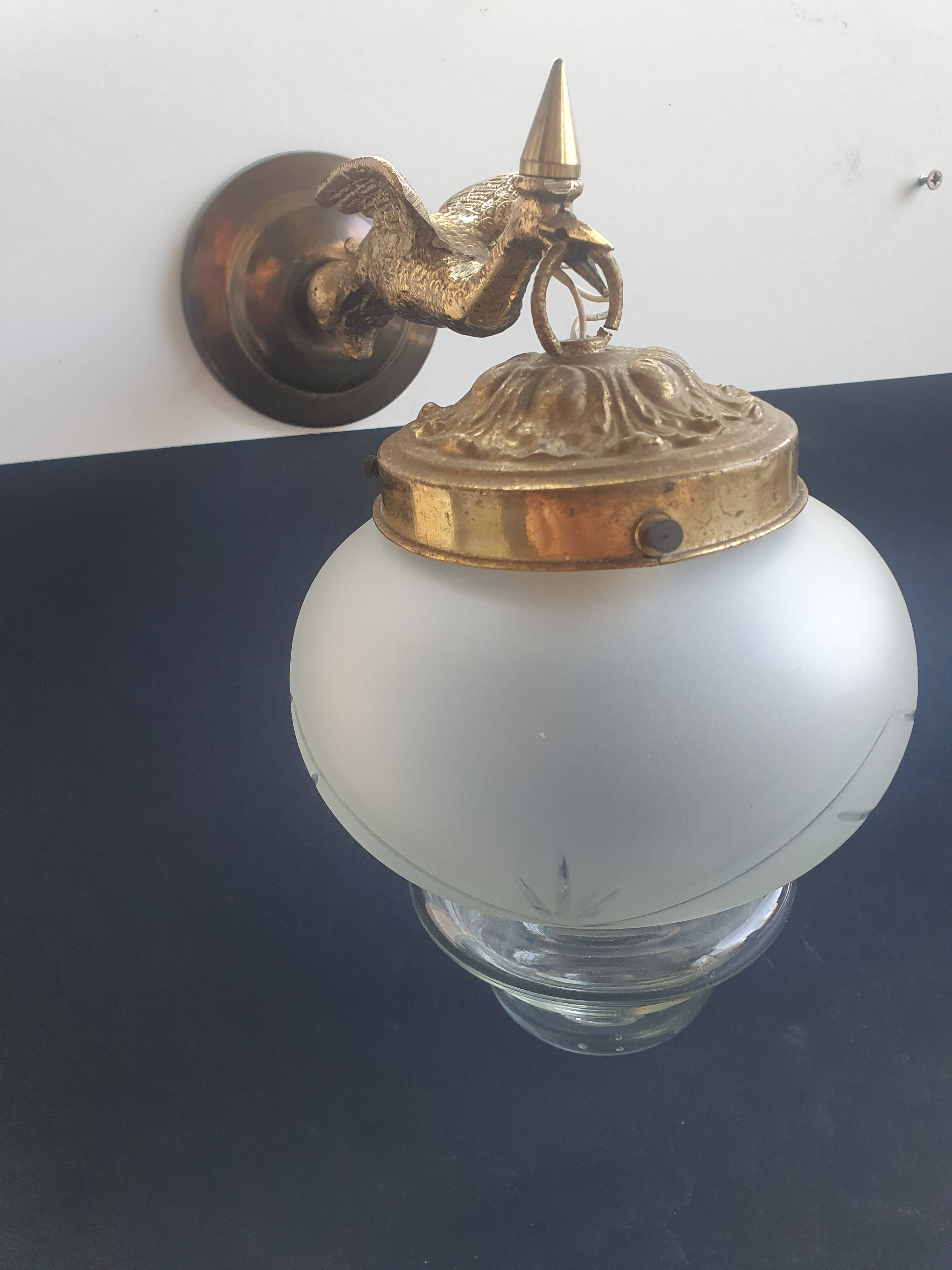 Pair of antique bronze wall sconces