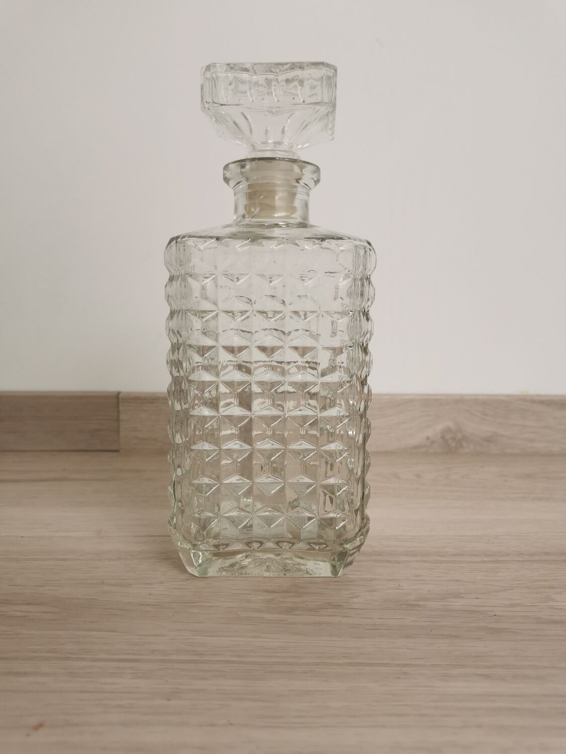 Carved old whisky decanter