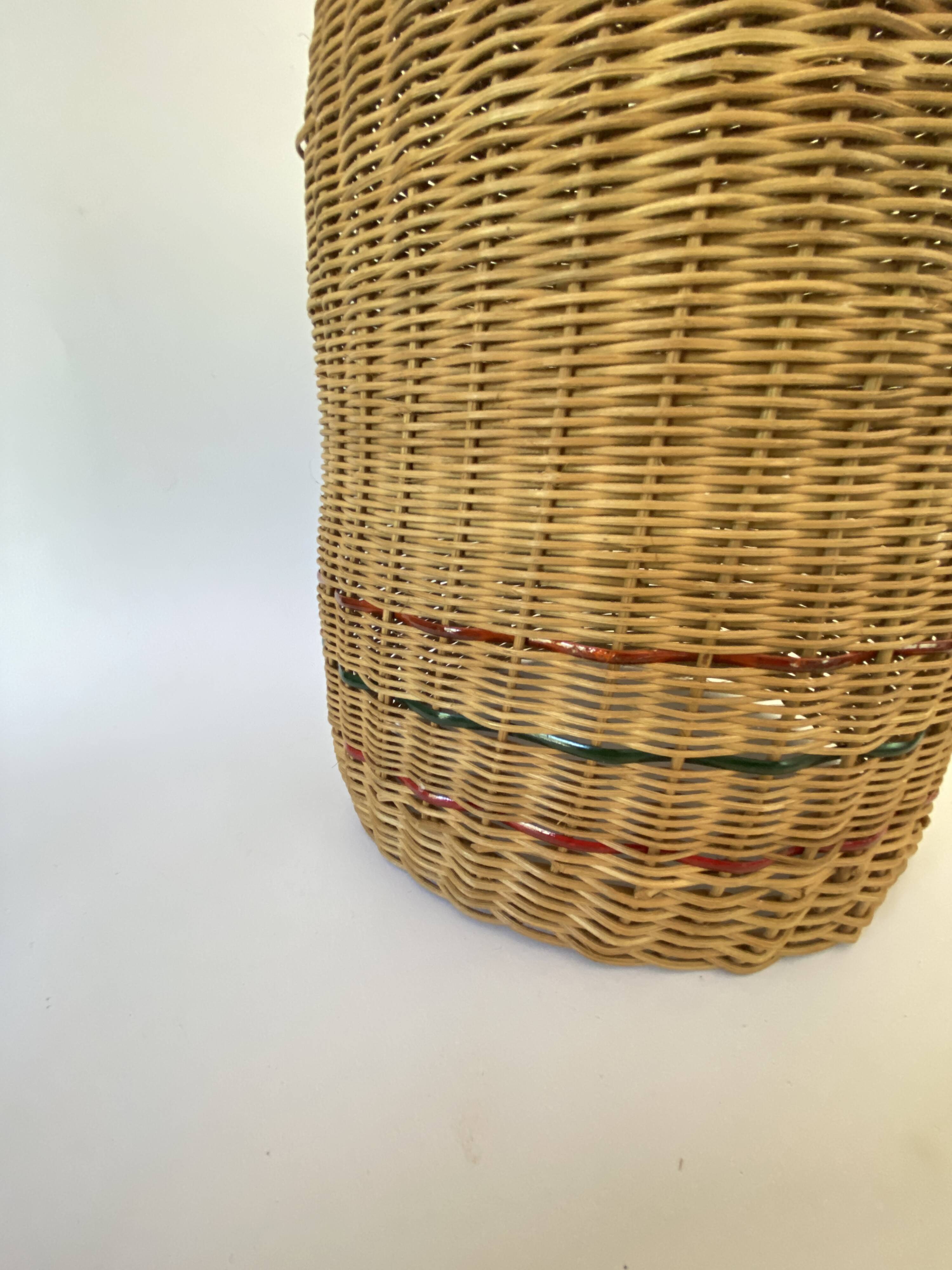 High basket with woven straws