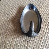 “Swan” pocket emptier