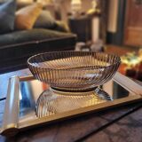 Smoked glass bowl with a radiating embossed pattern — 1970s