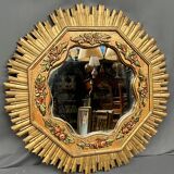 Large wooden mirror with golden sunbeams, Art Deco style.