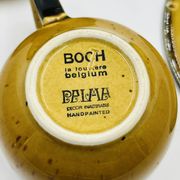 Set of four vintage Boch Palma cups and saucers.