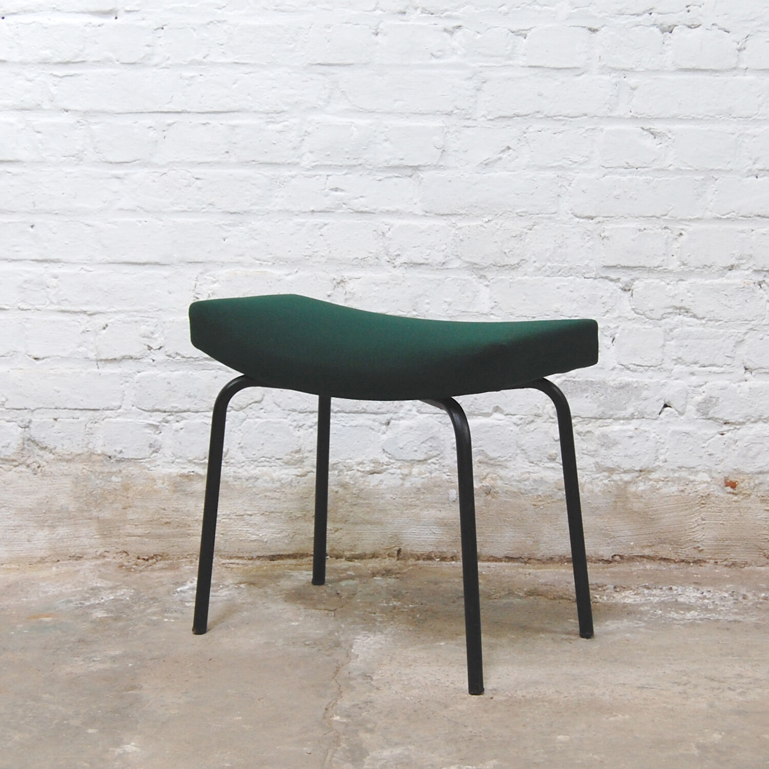 Footrest model "Bull" by Pierre Guariche for Meurop