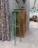 Vintage wooden stool with green patina.