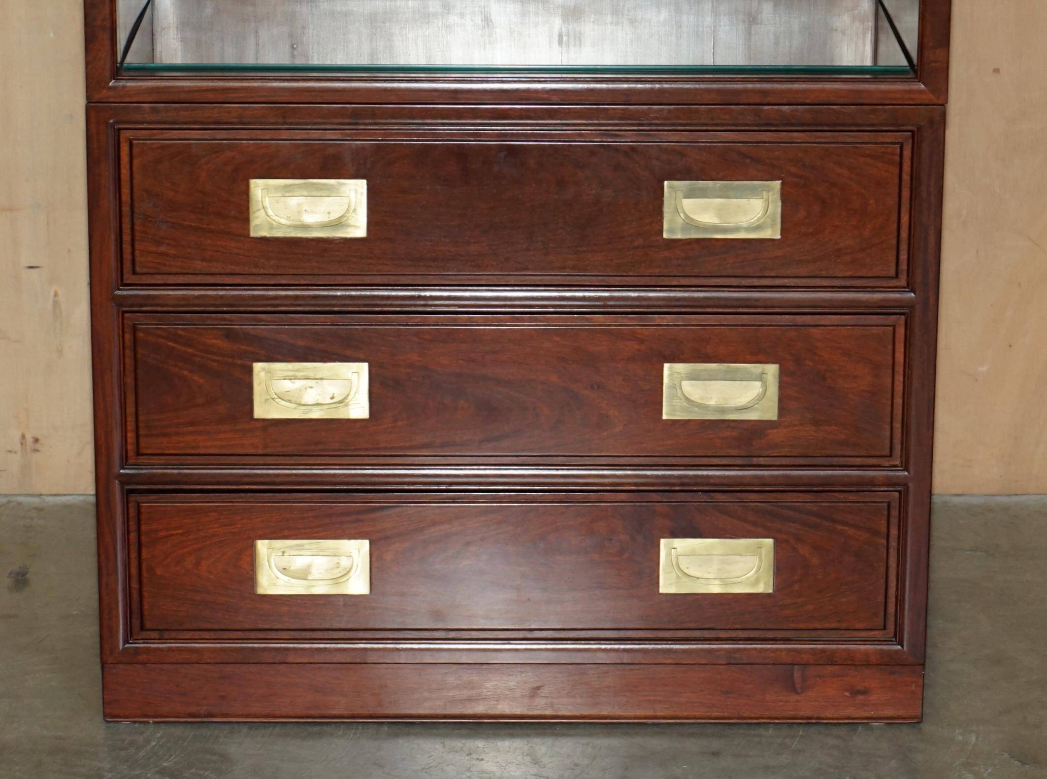 Set of three vintage hardwood military-style bookshelves.