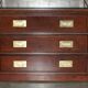Set of three vintage hardwood military-style bookshelves.