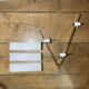 Pair of asymmetrical Hollywood Regency sconces, bronze - opaline glass, 70s
