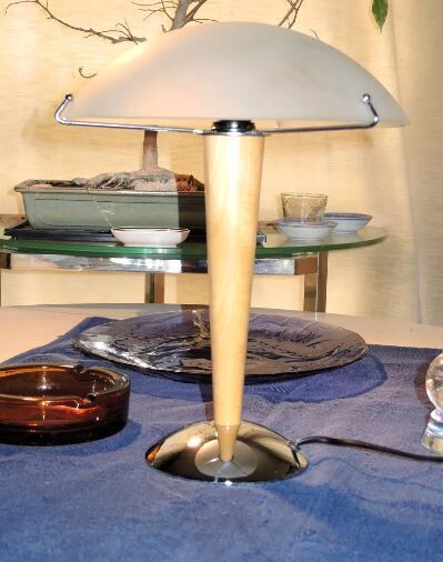 Table lamp legs chrome wood lampshade opaque glass.