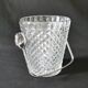 Vintage glass ice bucket stamped with a metal handle