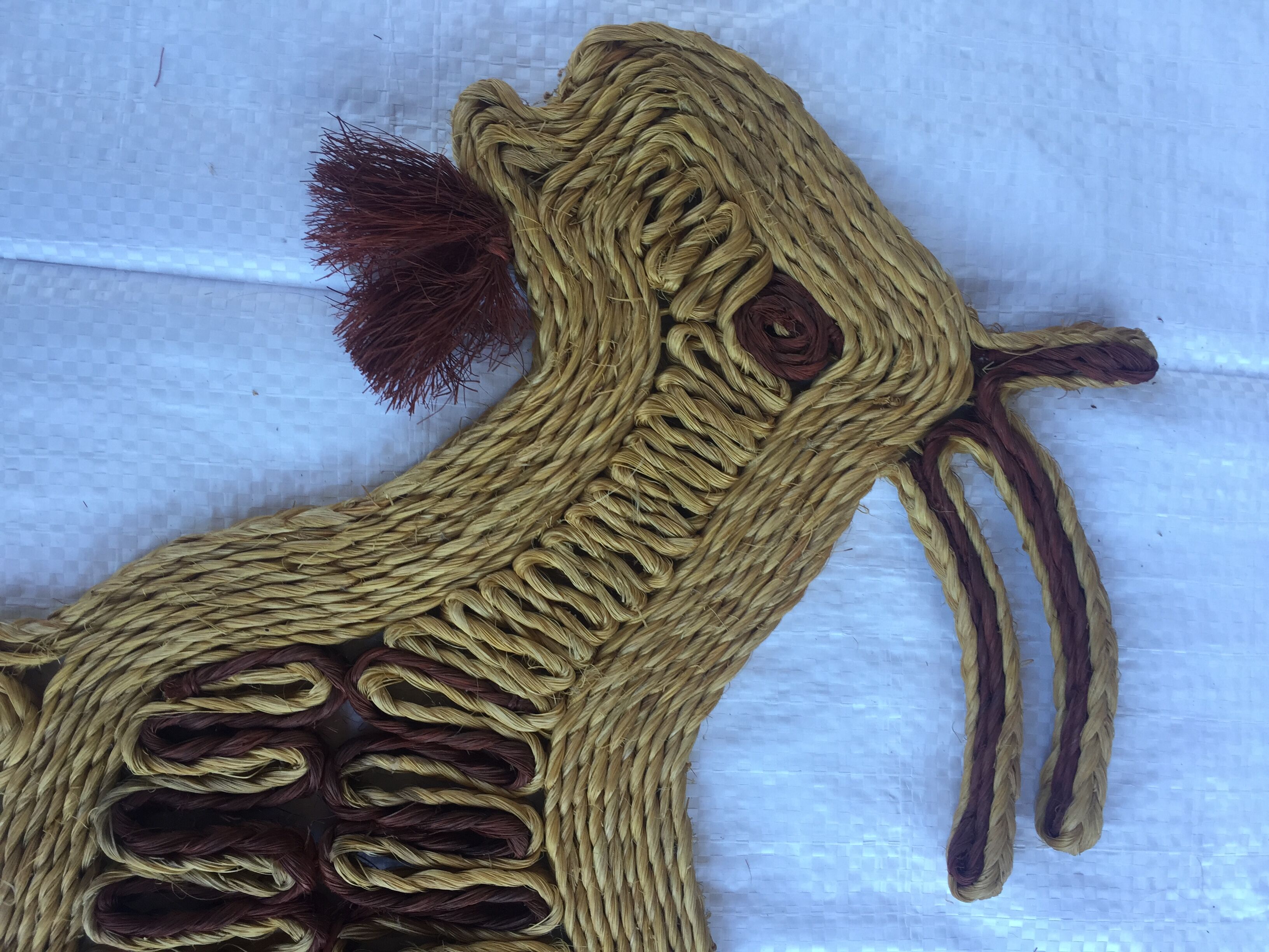 Trio of vintage rope animals table mats