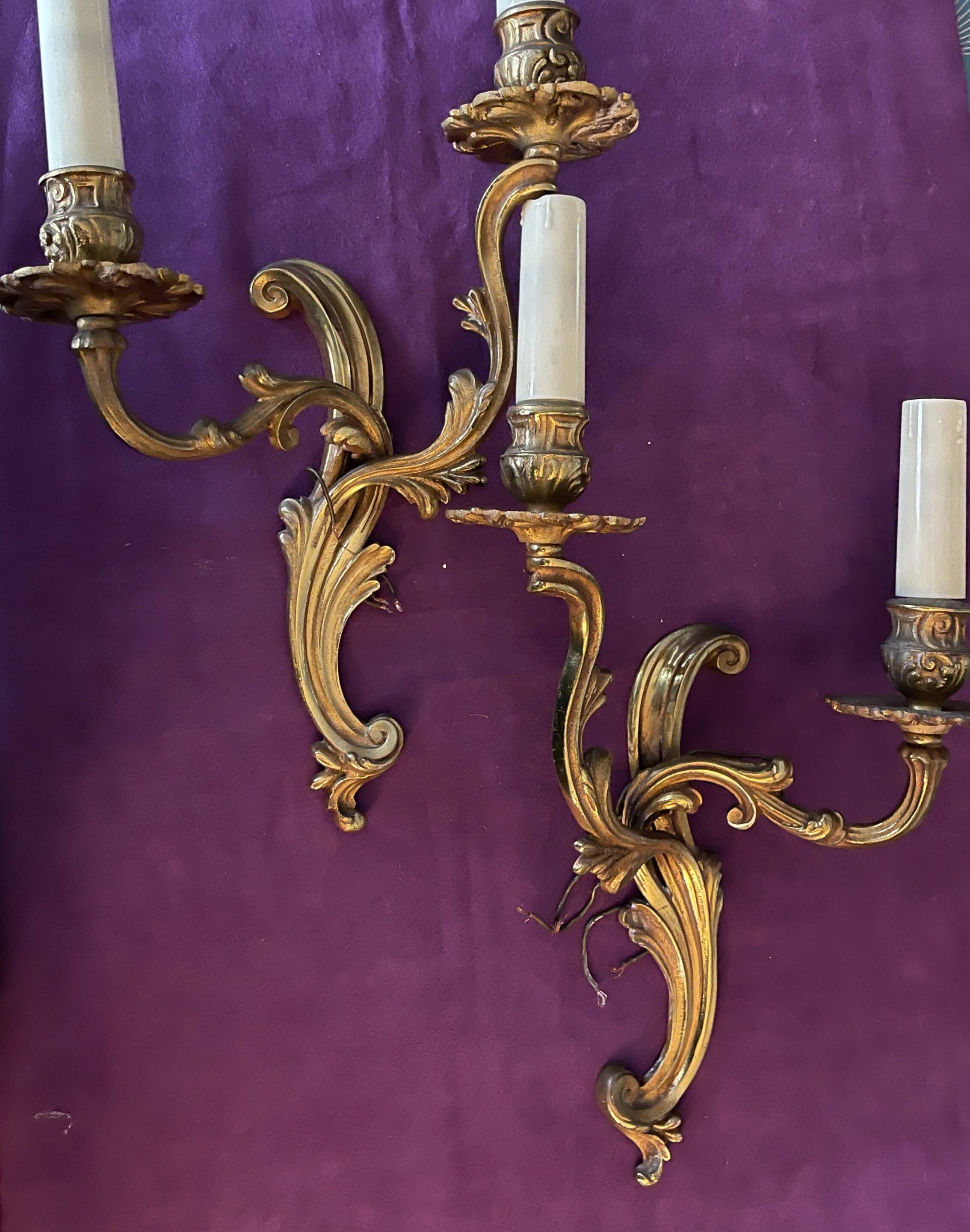 Pair of gilded bronze wall lights, 1950