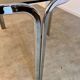Table ronde vintage tubulaire en métal et verre fumé design année 70