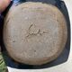 Empty terracotta pocket / ashtray