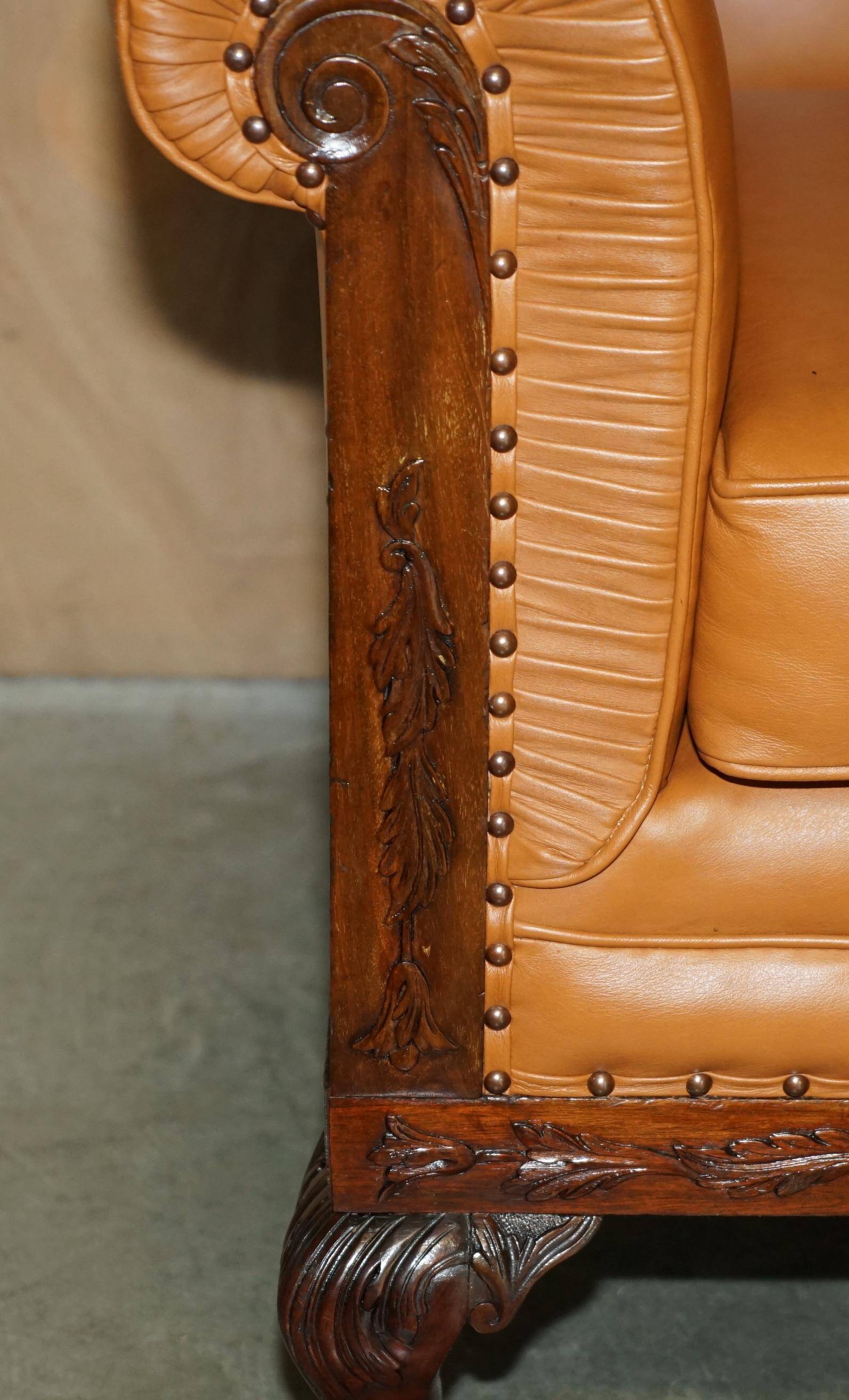 Restored three-seater leather canapé in late Victorian style.
