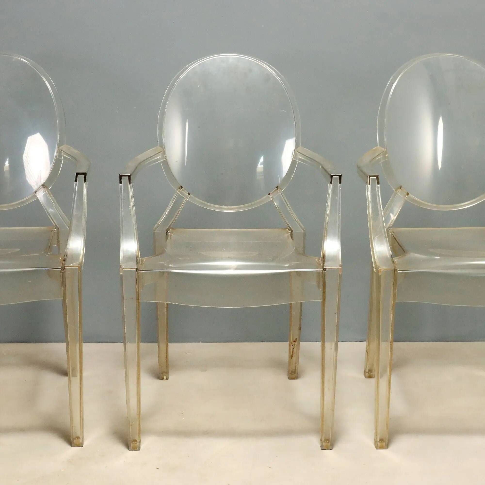 Louis Ghost chairs by Kartell designed by Philippe Starck from the 2000s.