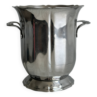 Silver metal champagne bucket, integrated handles, classic design.