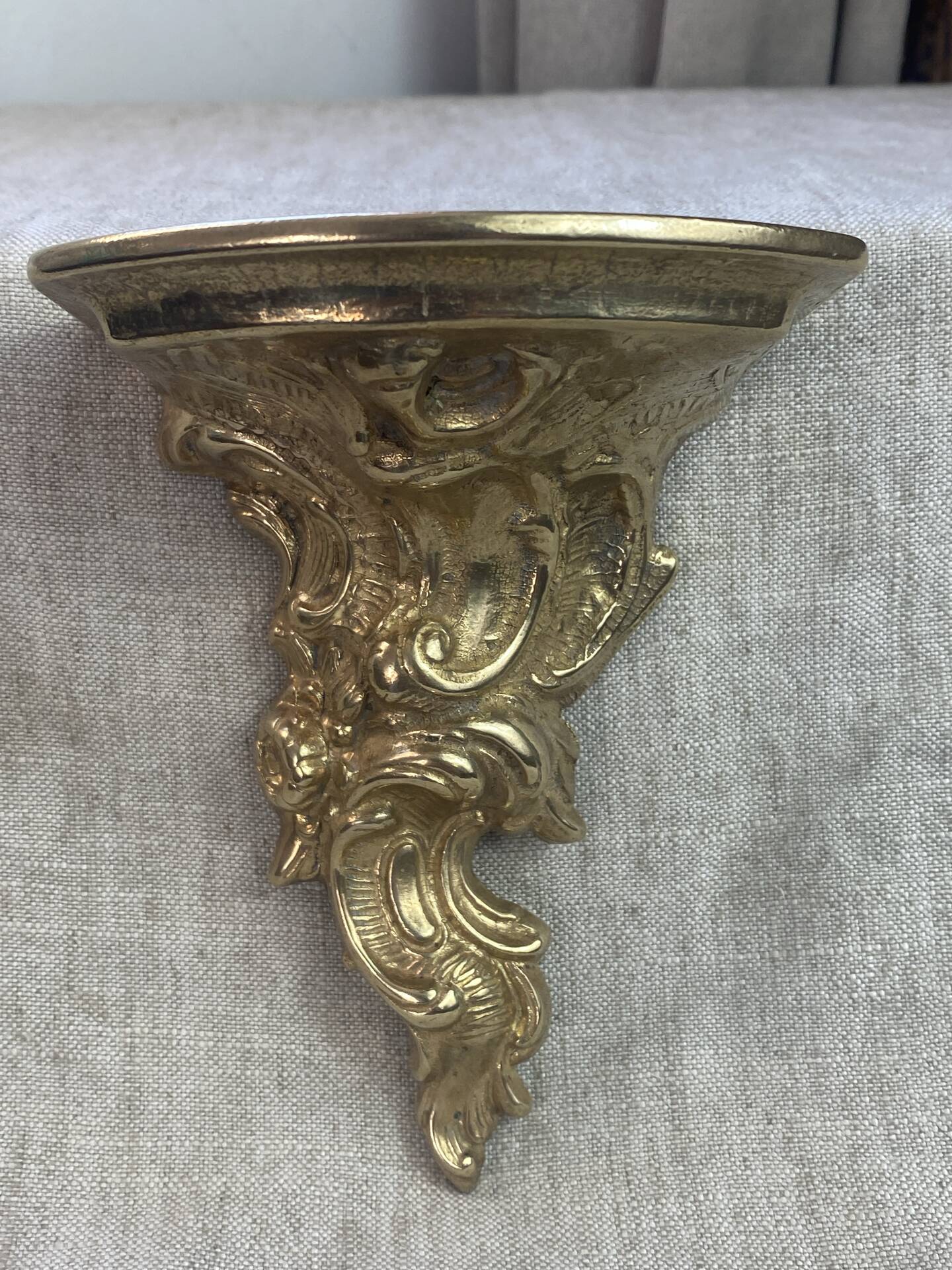 Small wall console in Rococo style in bronze