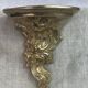 Small wall console in Rococo style in bronze