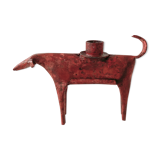 Zoomorphic candlestick made of red metal