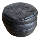 Patchwork black leather pouf de Sède