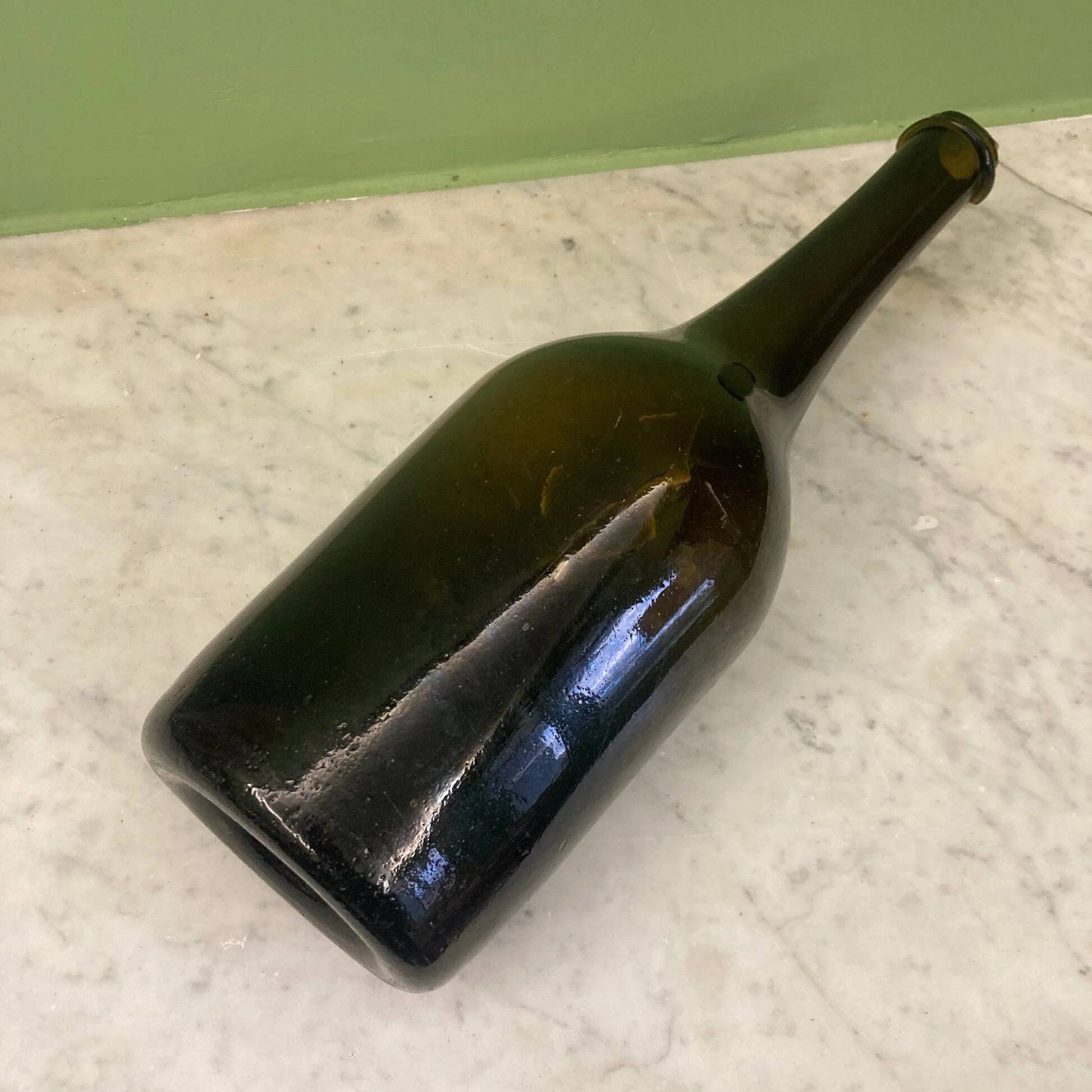 18th-century antique blown glass bottle