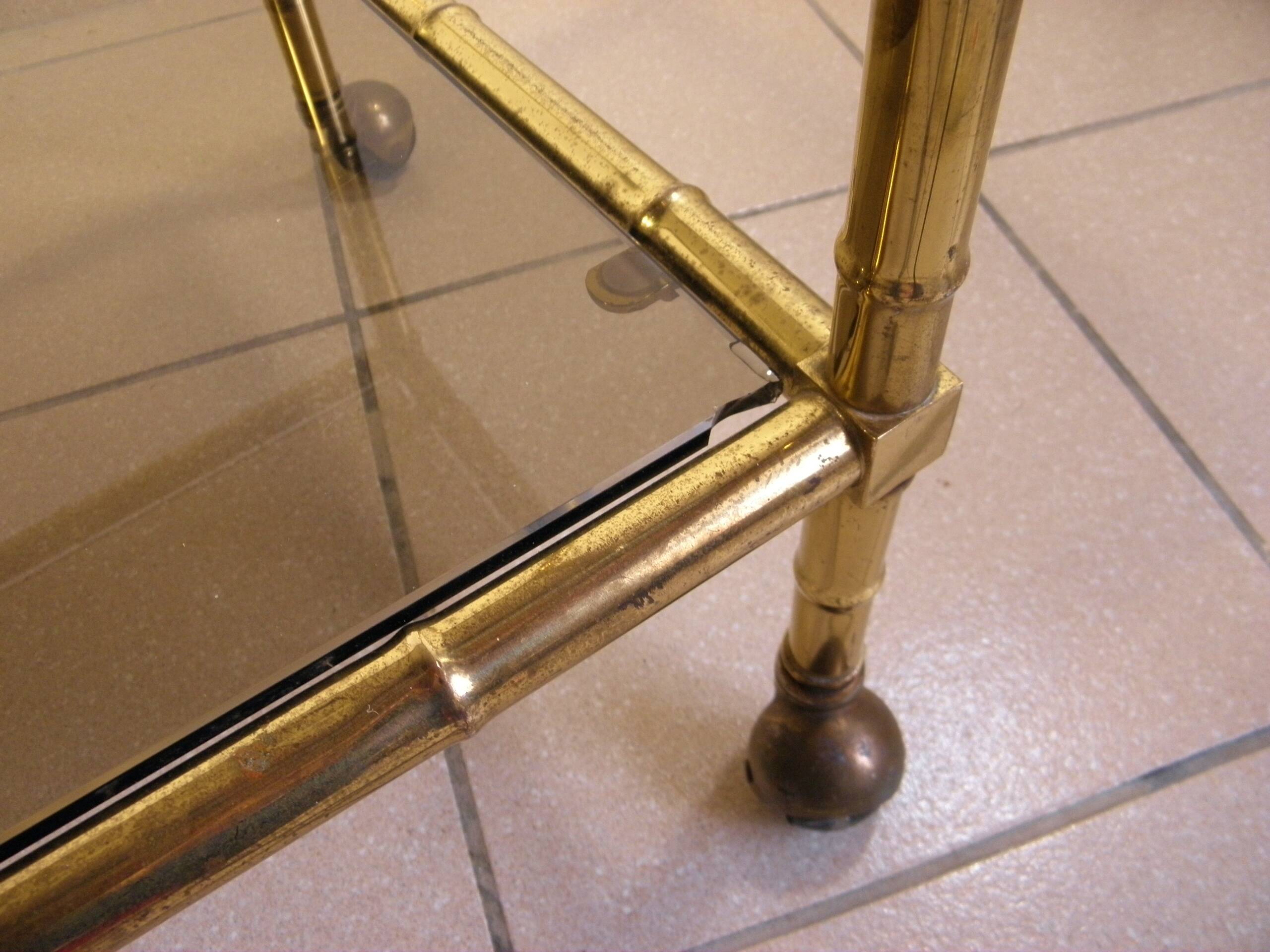 Serving trolley, table on wheels in "bamboo" brass