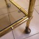 Serving trolley, table on wheels in "bamboo" brass