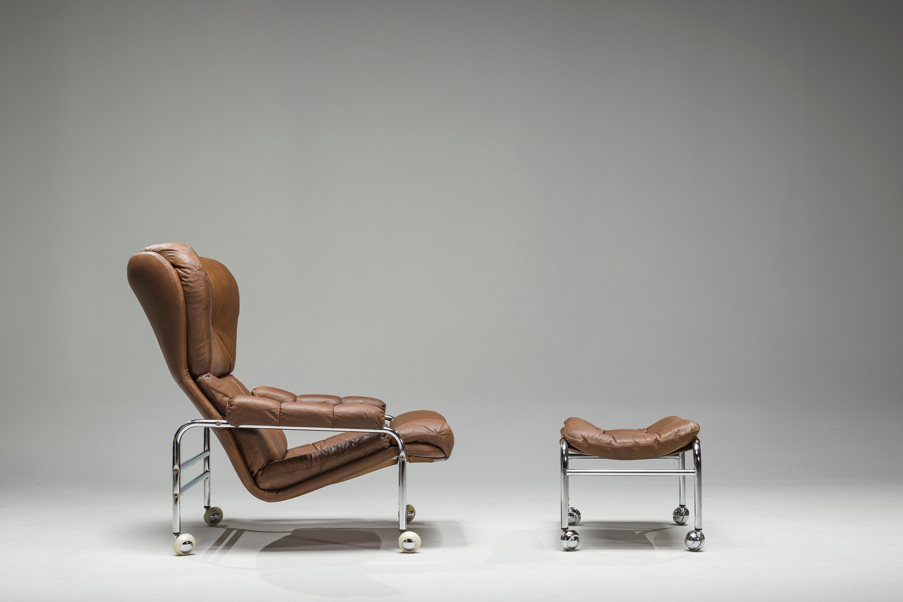 Swedish Lounge Chair and Ottoman in Chrome and Brown Leather by Scapa Rydaholm, 1960s, Set of 2