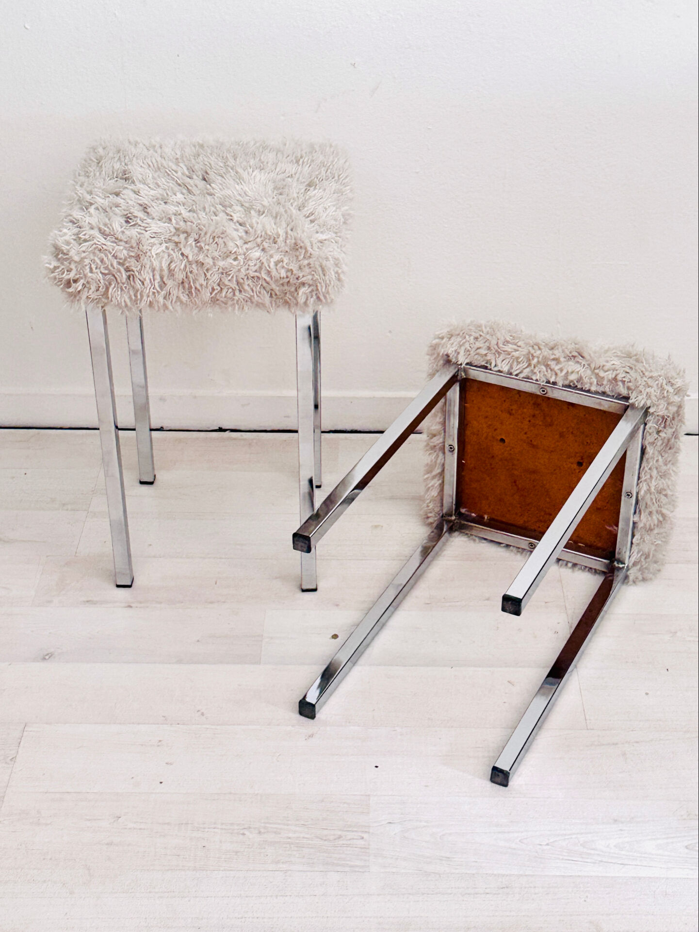 Set of two vintage chrome stools with fluffy upholstery