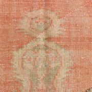 Tapis vintage rouge pâle