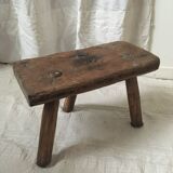 Crude wooden tripod stool