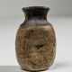 Small brutalist stoneware vase with a ribbed neck, France, circa 1960.