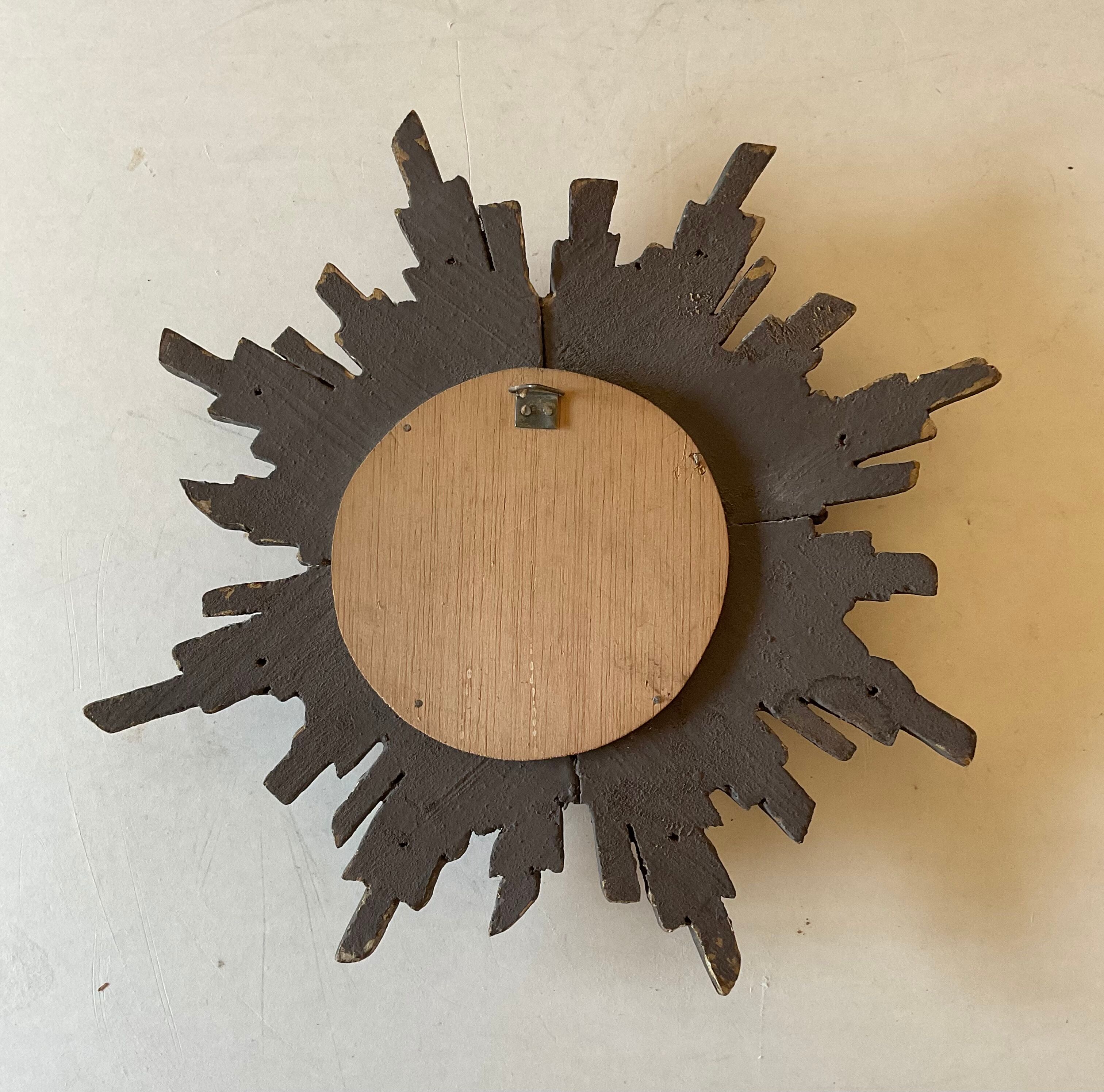 Miroir soleil vintage en bois doré