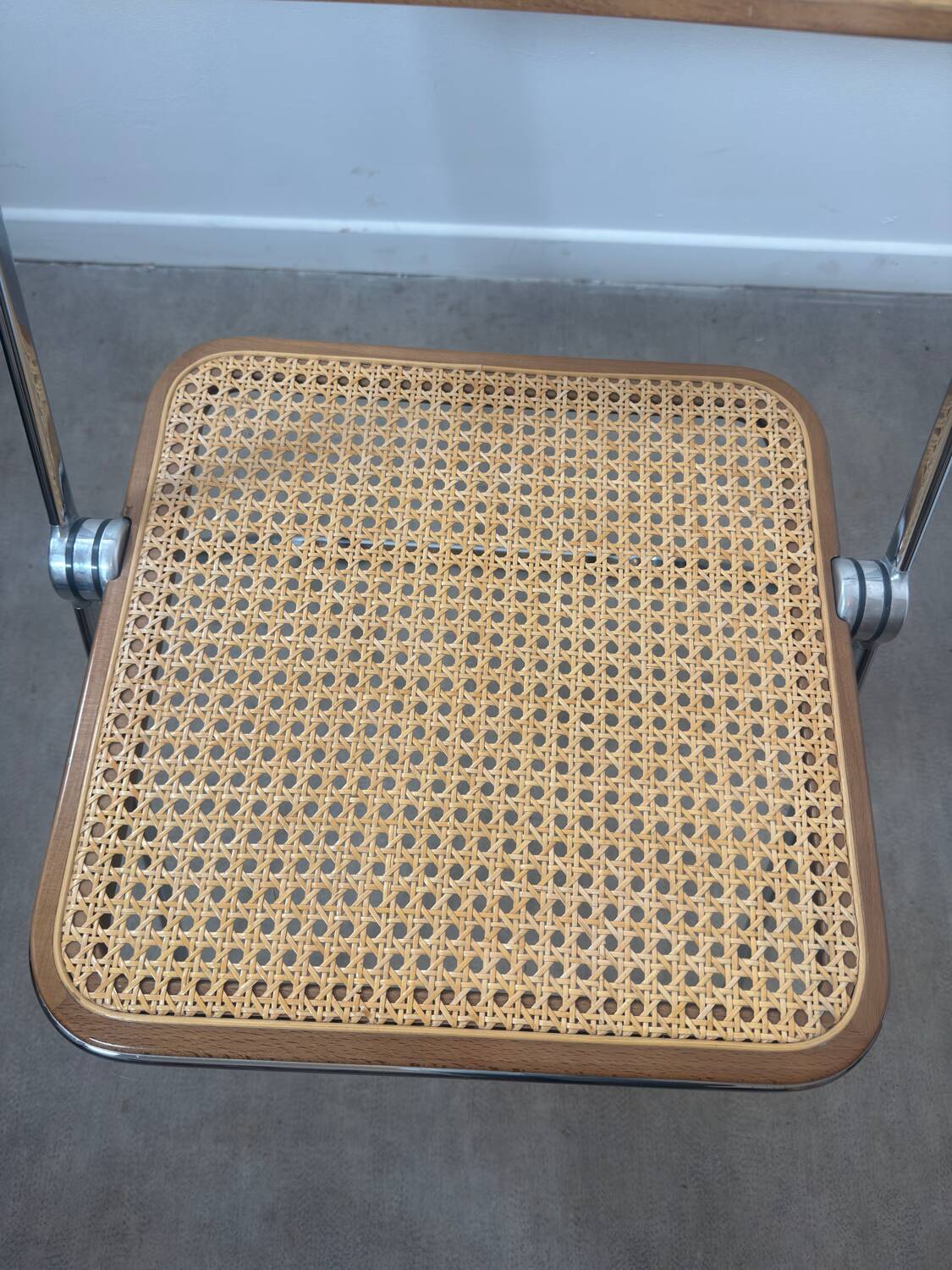 Plia folding chair by Giancarlo Piretti for Castelli – Rattan