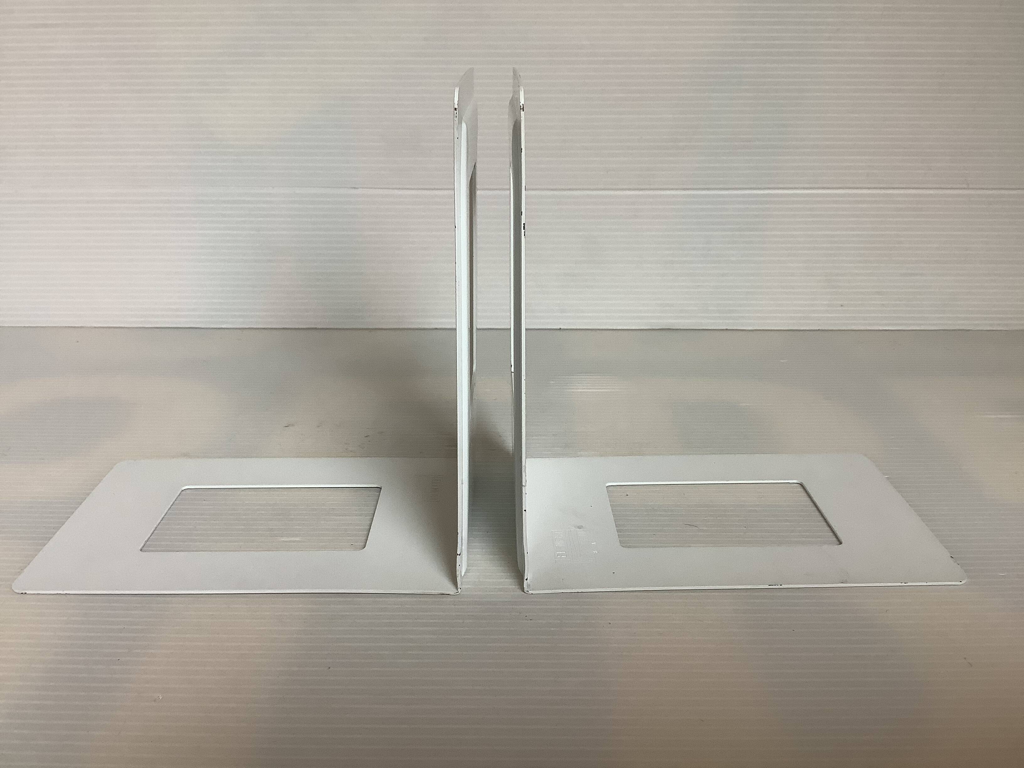 Pair of white metal bookends