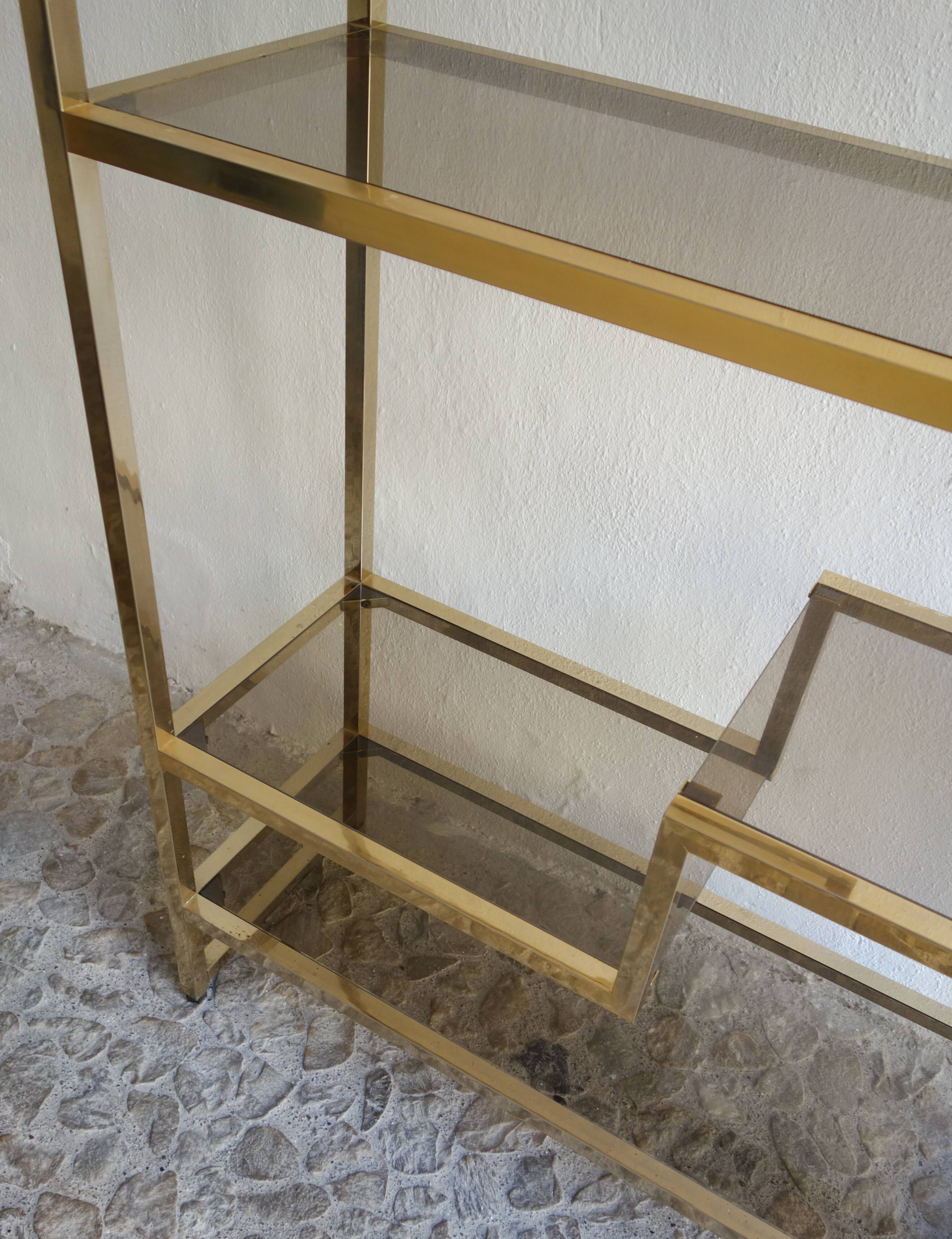 Bookcase or shelf in brass and smoked glass from the 70s