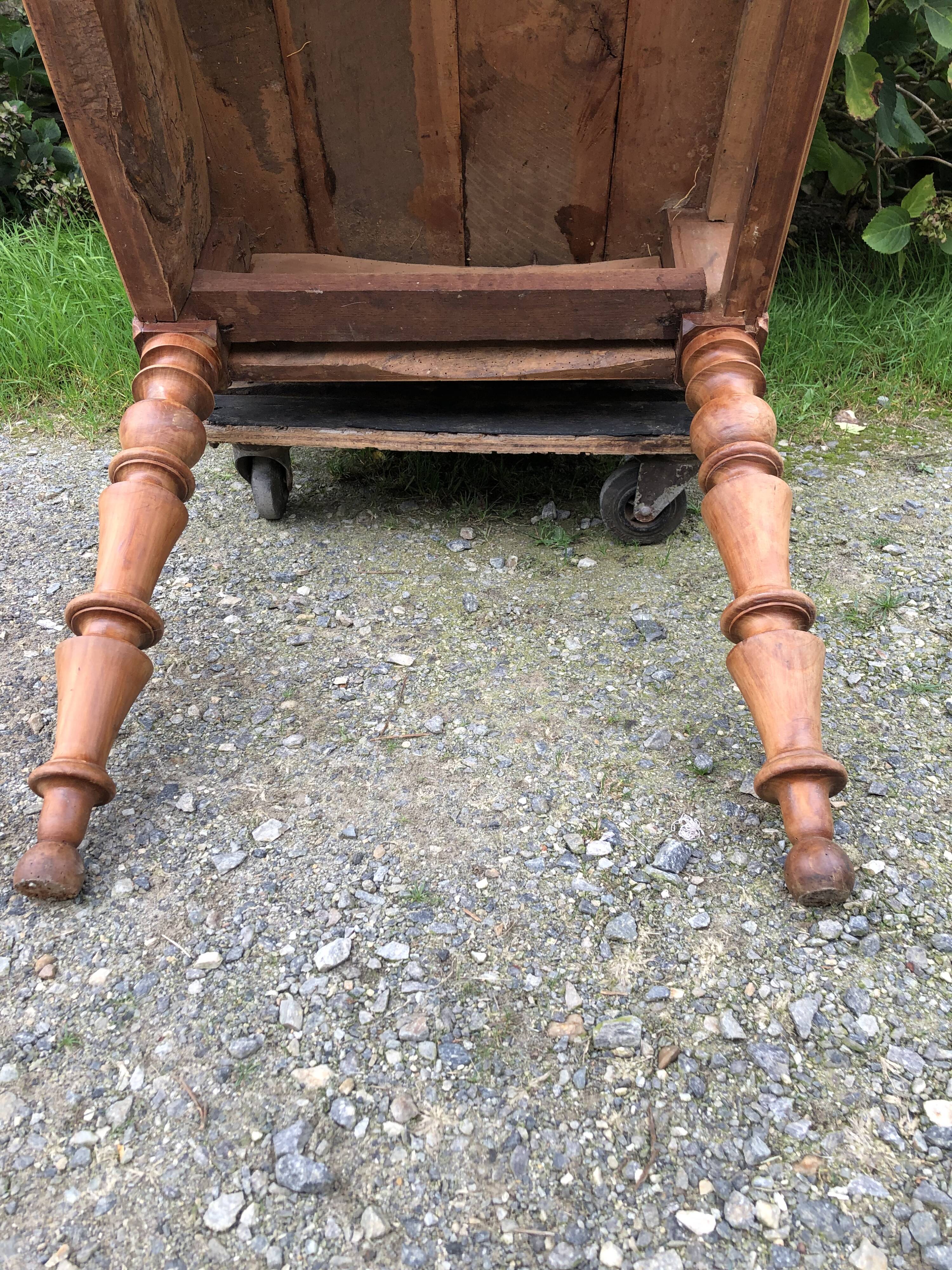 Antique Louis Philippe style farm table in solid cherry wood with 2 drawers and turned base.