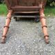 Antique Louis Philippe style farm table in solid cherry wood with 2 drawers and turned base.