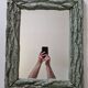 Old mirror, wooden bark frame with rustic patina, 65 cm by 50 cm