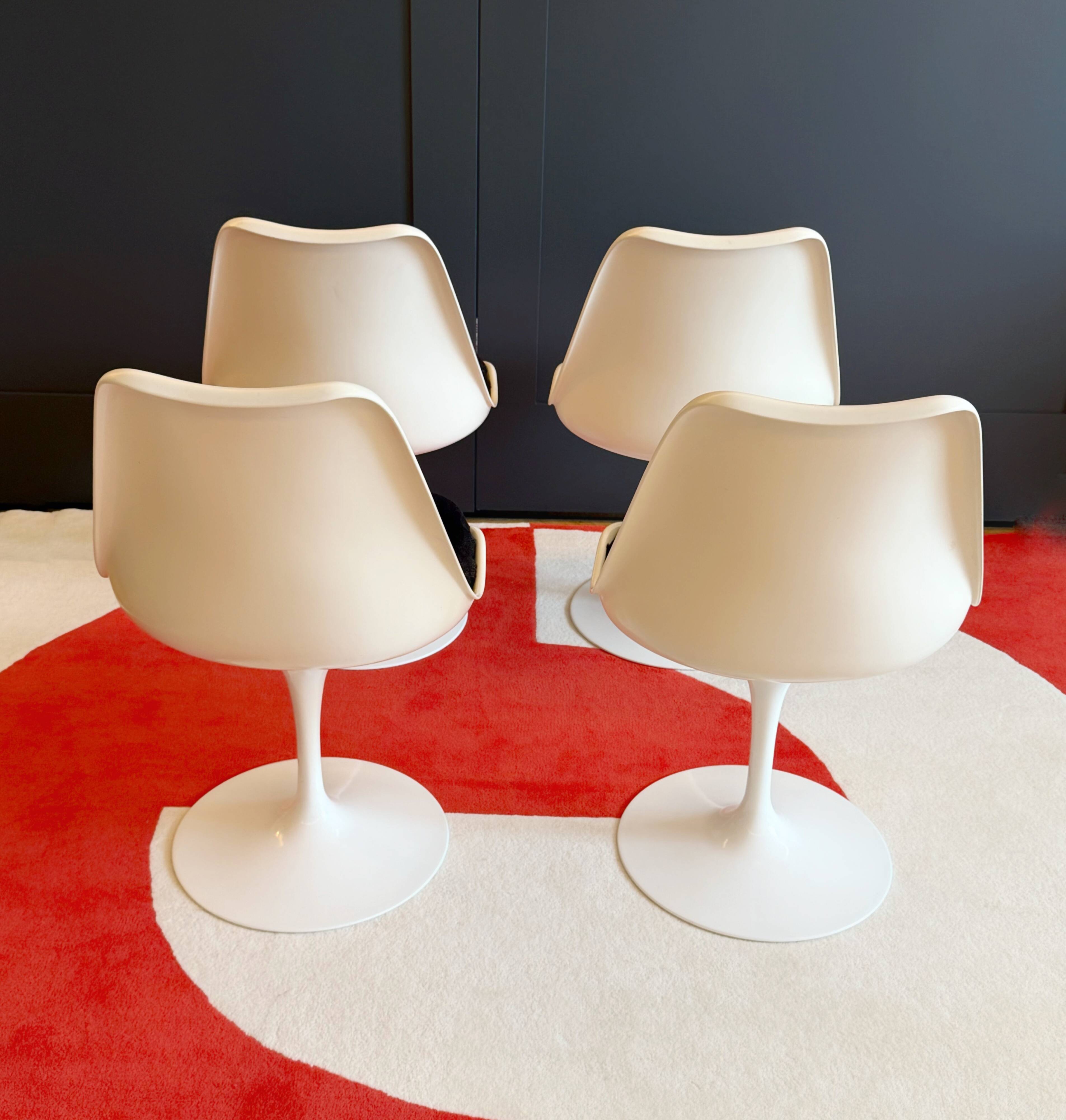 Series of 4 Tulip chairs by Eero Saarinen.  Knoll International