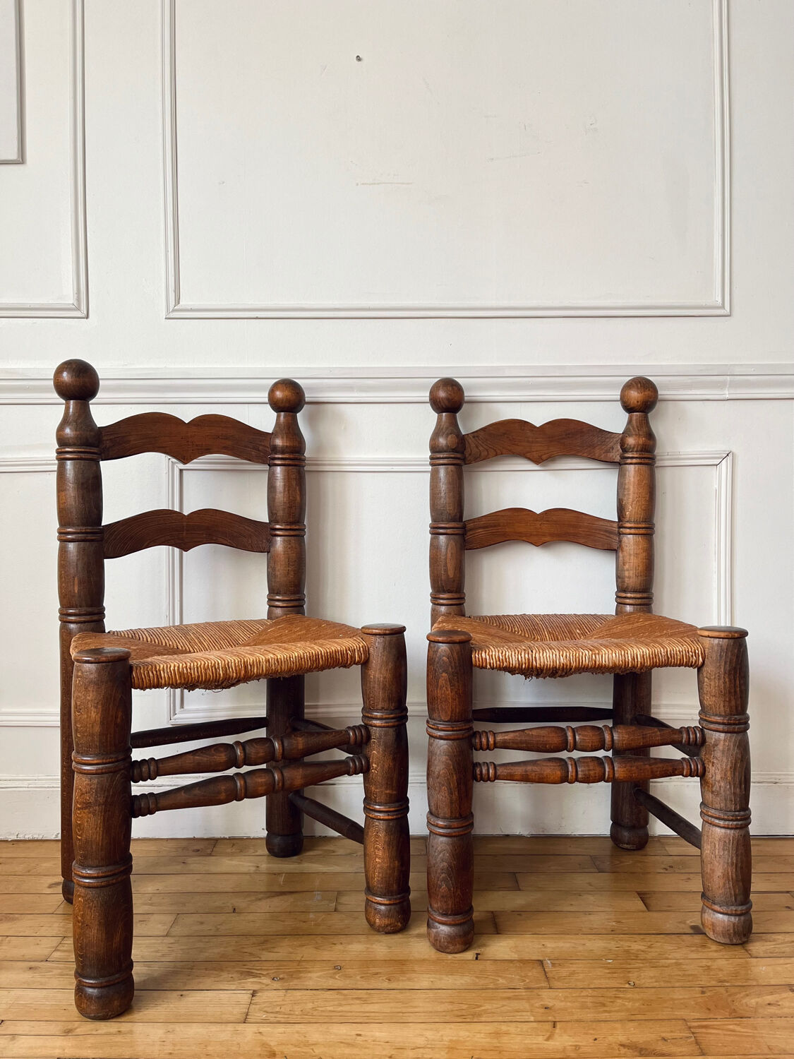 Pair of rustic chairs in the style of Charles Dudouyt.