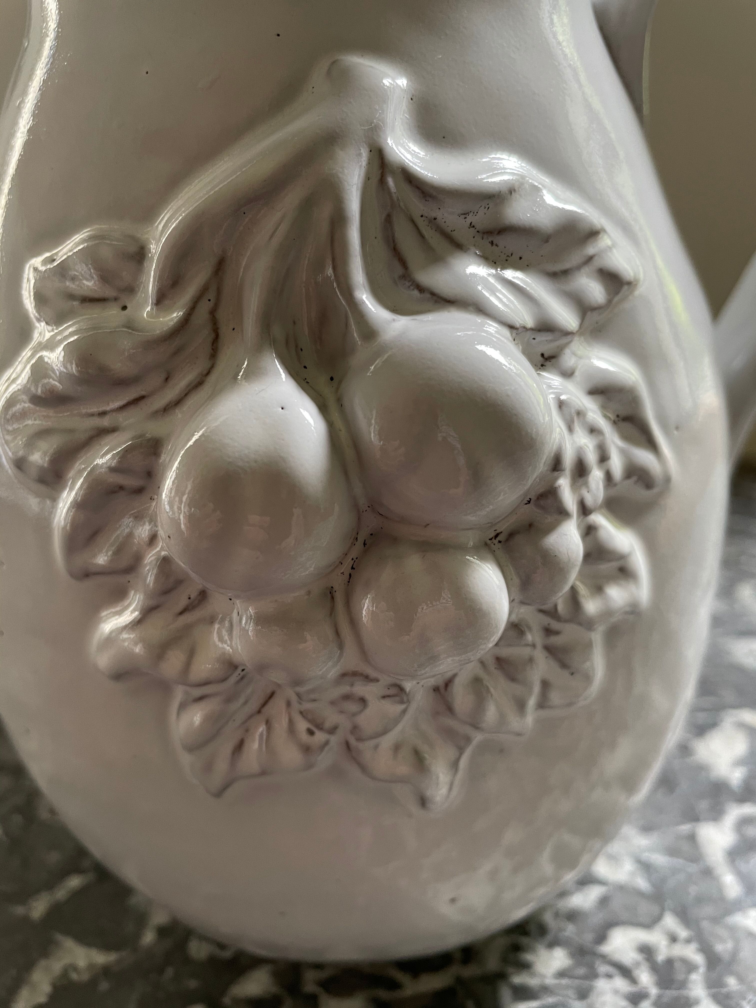 Pitcher in dabbling cherry decoration