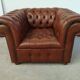 Brown leather chesterfield armchair