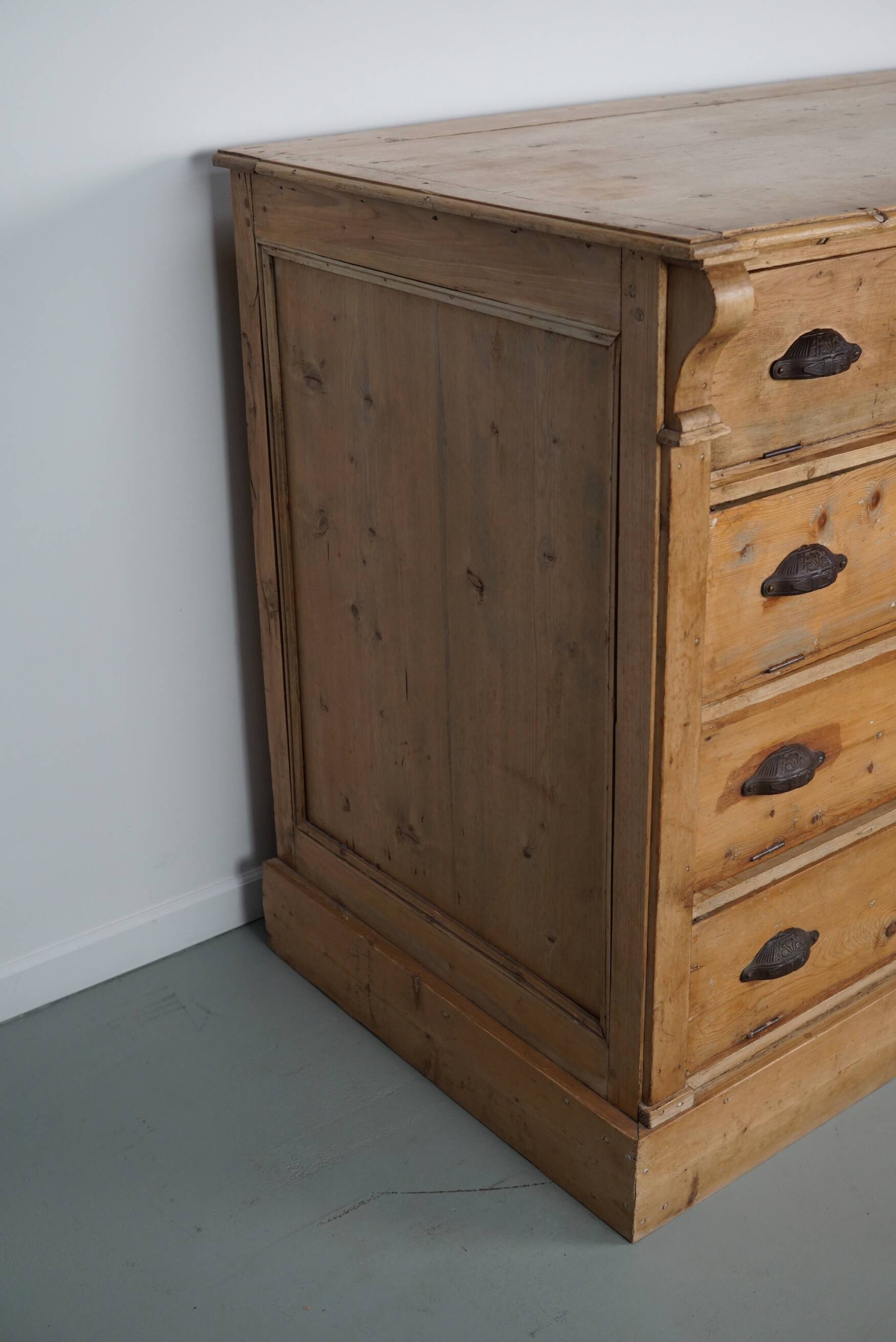Antique German pine shop cabinet, early 20th century