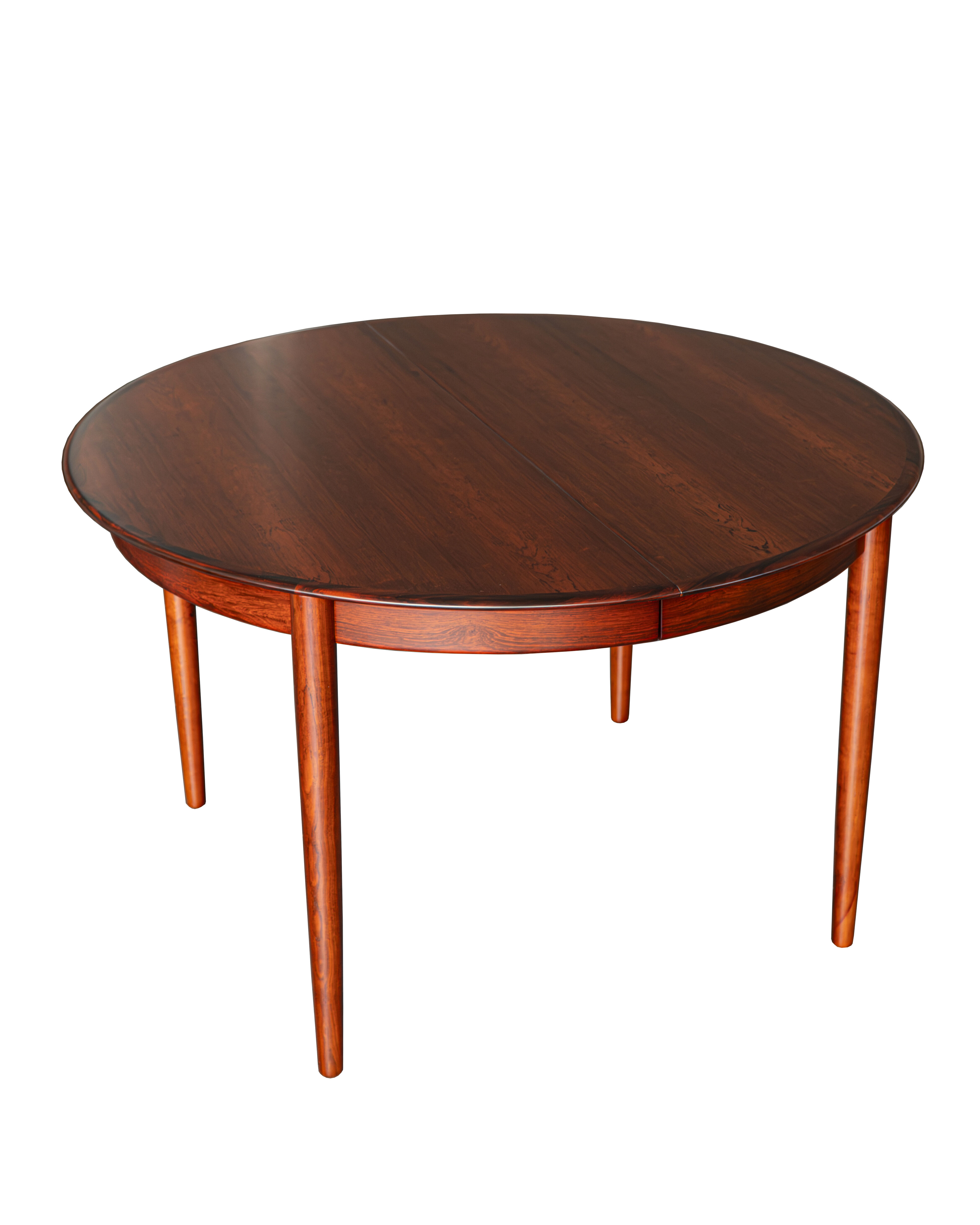 Danish extendable rosewood dinning table by Skovby