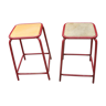 Pair of old red industrial stools